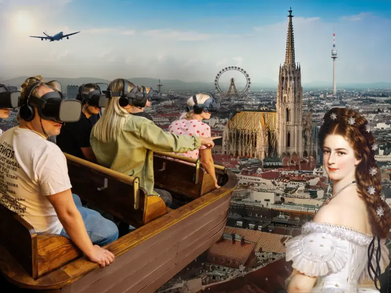 Menschen mit VR-Brillen fahren mit einem Boot über Wien hinweg, während Kaiserin Elisabeth von Österreich im Vordergrund steht.